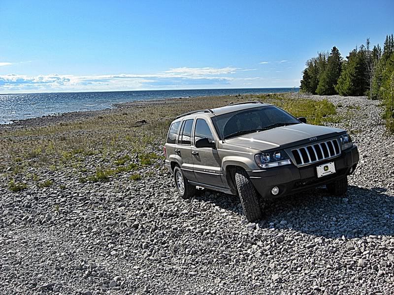 IMAGE: http://i68.photobucket.com/albums/i21/mrbell83/Jeeponthebeach.jpg