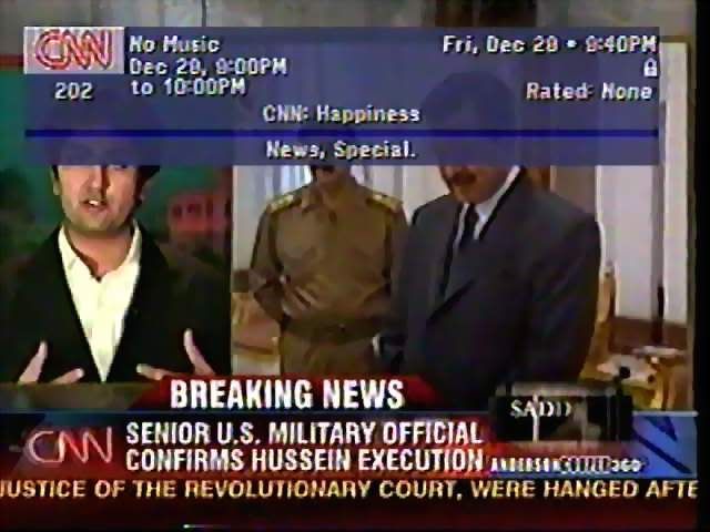 CNN reports Saddam Hussein has been executed. DirecTV program guide refers to the program as 'Happiness'