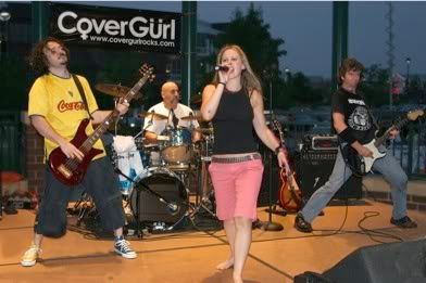 Jessica Robinson-CoverGurl barefoot on stage