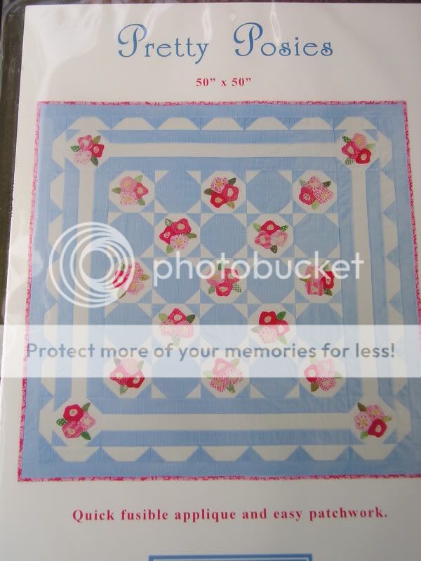 This quilt features quick fusible applique and easy patchwork